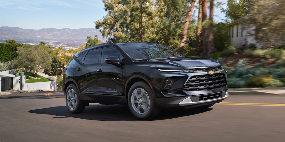 2024 Chevrolet Blazer Driving Through the City at Night