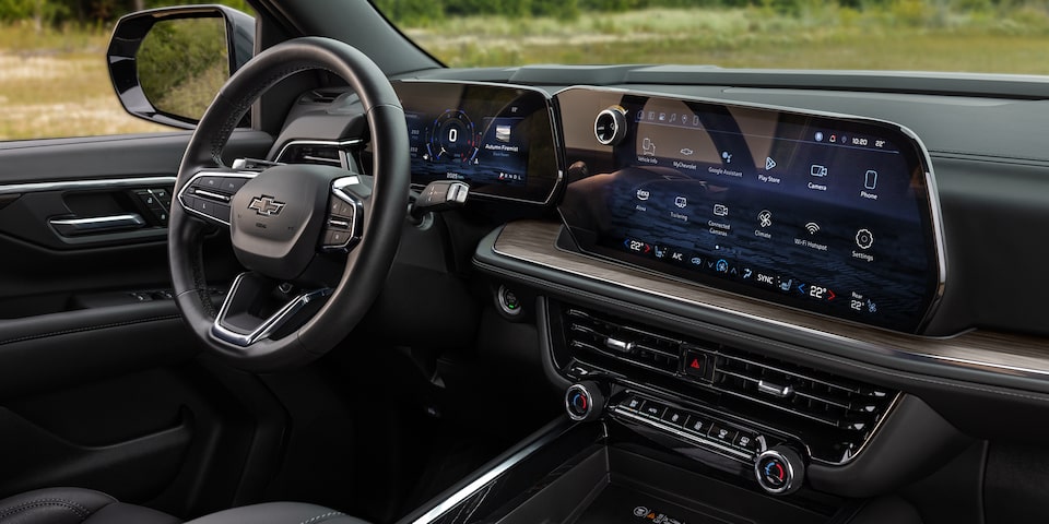 View of the Front Seats, Steering Wheel, and Infotainment System in the 2025 Chevrolet Tahoe SUV